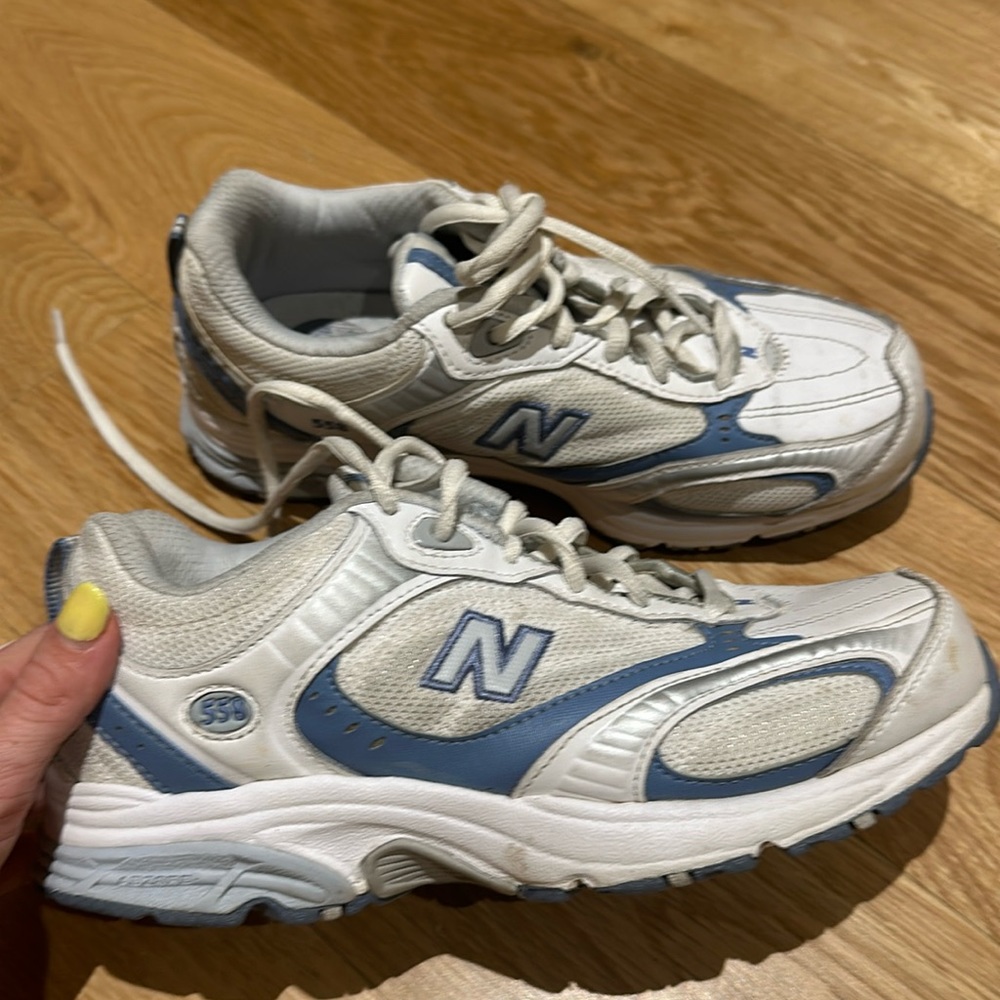 White and blue New Balance 558s